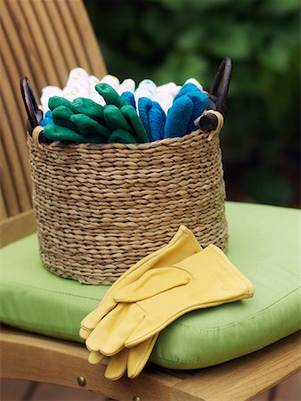 Basket of Gardening Gloves on Chair Stock Photo - Premium Royalty-Free, Code: 600-01955456