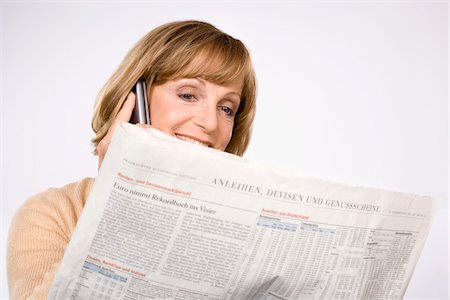 simsearch:600-01463921,k - Woman with Cellular Phone and Newspaper Stock Photo - Premium Royalty-Free, Code: 600-01955824