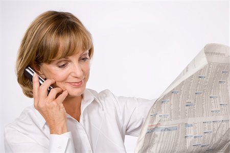 simsearch:600-01463921,k - Woman with Cellular Phone and Newspaper Stock Photo - Premium Royalty-Free, Code: 600-01955830