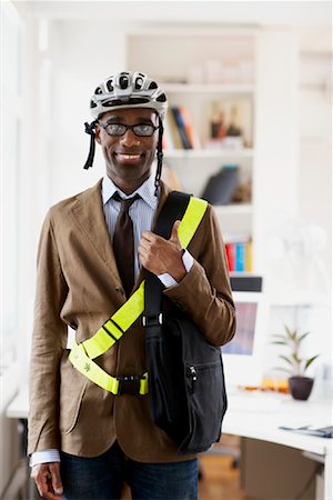 Businessman in Bicycle Helmet Foto de stock - Sin royalties Premium, Código: 600-01956071