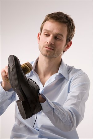 pulir - Man Polishing Shoes Foto de stock - Sin royalties Premium, Código: 600-02010053