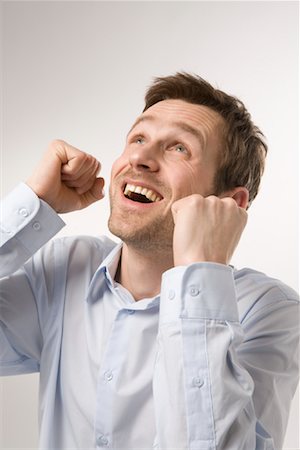 Portrait of Man Cheering Stock Photo - Premium Royalty-Free, Code: 600-02010064