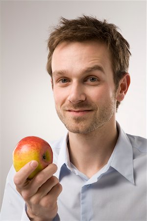 people with fruits cutout - Portrait of Man Holding Apple Foto de stock - Sin royalties Premium, Código: 600-02010067