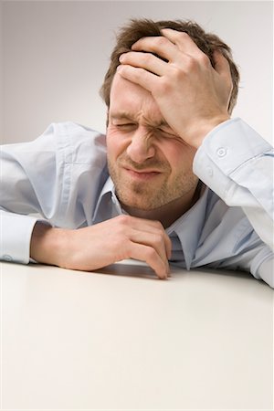 Portrait of Man With Headache Stock Photo - Premium Royalty-Free, Code: 600-02010069