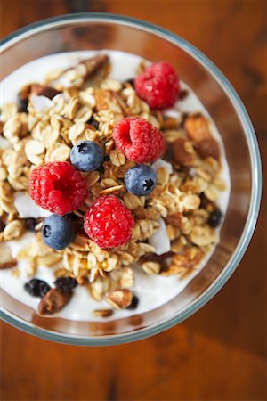 simsearch:600-05947686,k - Bowl of Cereal with Raspberries and Blueberries Stock Photo - Premium Royalty-Free, Code: 600-02033710