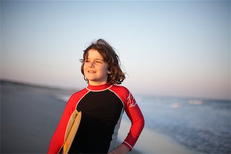 surfer at sunrise - Portrait of Surfer, Ocracoke Island, Cape Hatteras, North Carolina, USA Stock Photo - Premium Royalty-Free, Code: 600-02046093