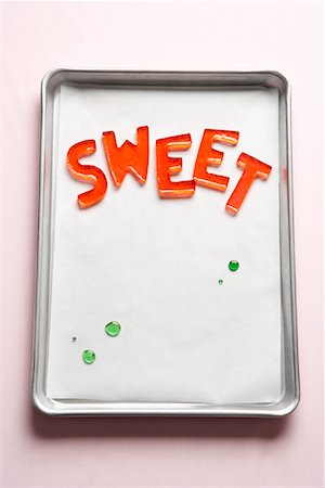 Candy Letters on Baking Tray Foto de stock - Sin royalties Premium, Código: 600-02046476