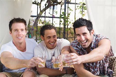 diverse group of friends - Men at a Party Stock Photo - Premium Royalty-Free, Code: 600-02046887