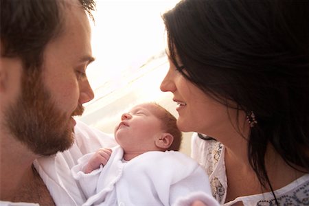 Portrait of Parents With Newborn Baby Stock Photo - Premium Royalty-Free, Code: 600-02046954