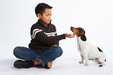 Boy with Dog Foto de stock - Sin royalties Premium, Código: 600-02055849