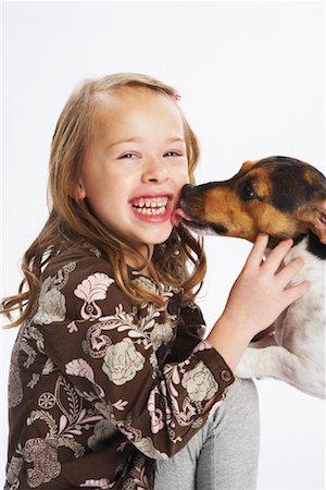 dog lick ã  girl - Girl with Dog Stock Photo - Premium Royalty-Free, Code: 600-02055841