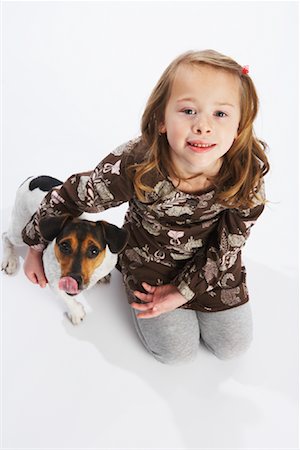 simsearch:600-06531469,k - Fille avec un chien Photographie de stock - Premium Libres de Droits, Code: 600-02055842