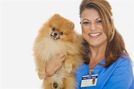 fluffy fur dog - Portrait of Veterinarian With Dog Stock Photo - Premium Royalty-Free, Code: 600-02056604