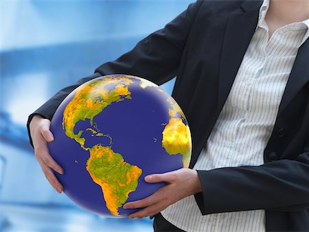 south american earth pictures - Woman Holding Earth Stock Photo - Premium Royalty-Free, Code: 600-02071258
