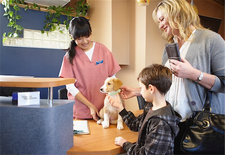 simsearch:700-00342104,k - Boy and Woman with Dog at Veterinarian's Office Stock Photo - Premium Royalty-Free, Code: 600-02071400