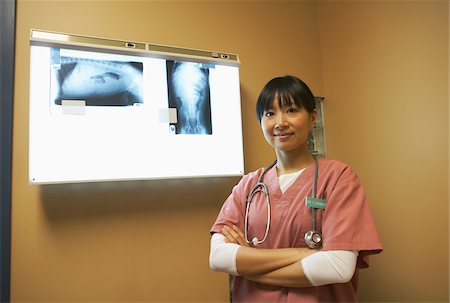 portrait of vet - Veterinarian with X-Rays Stock Photo - Premium Royalty-Free, Code: 600-02071447