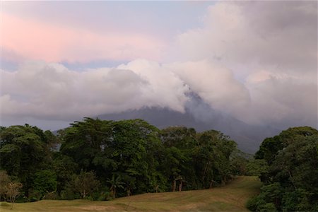 Volcano in Clouds, Arenal Volcano, Costa Rica Stock Photo - Premium Royalty-Free, Code: 600-02080227