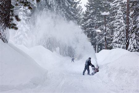 shoveling - People Clearing Snow After Storm Stock Photo - Premium Royalty-Free, Code: 600-02080909