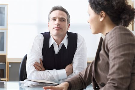 executives brainstorming - Business People Talking at Desk Stock Photo - Premium Royalty-Free, Code: 600-02081745