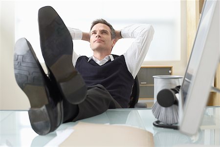 soles male - Businessman Day Dreaming at Desk Stock Photo - Premium Royalty-Free, Code: 600-02081741