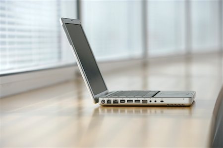 Laptop Computer on Counter Stock Photo - Premium Royalty-Free, Code: 600-02130415