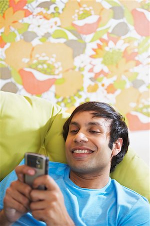 Man Using Electronic Organizer Foto de stock - Sin royalties Premium, Código: 600-02199826