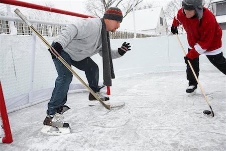 Men Playing Hockey Foto de stock - Sin royalties Premium, Código: 600-02200117