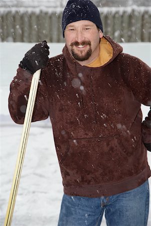 Portrait of Man with Hockey Stick Fotografie stock - Premium Royalty-Free, Codice: 600-02200124