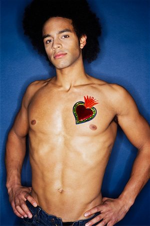 Portrait of Man With Heart on Chest Stock Photo - Premium Royalty-Free, Code: 600-02200265