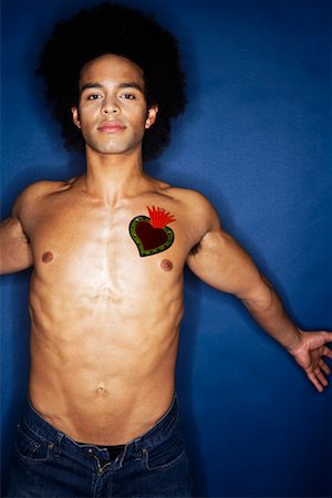 Portrait of Man With Heart on Chest Stock Photo - Premium Royalty-Free, Code: 600-02200266