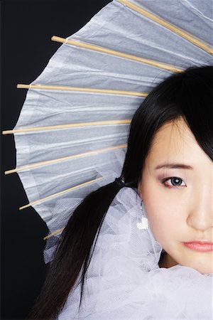 Portrait of Woman With Parasol Stock Photo - Premium Royalty-Free, Code: 600-02200276