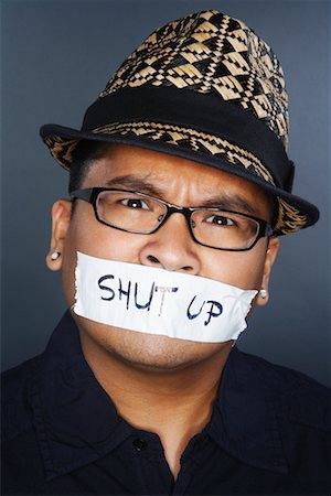 Tape With Shut Up Written on it Covering Man's Mouth Foto de stock - Sin royalties Premium, Código: 600-02200295