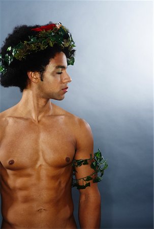 Portrait d'un homme avec une couronne sur la tête et les bras Photographie de stock - Premium Libres de Droits, Code: 600-02200300