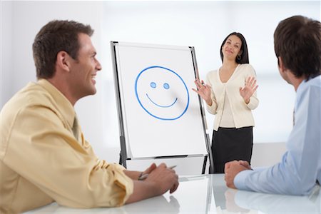 smiley - Businesspeople at Work Stock Photo - Premium Royalty-Free, Code: 600-02201120