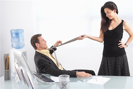flirt tug - Businesspeople at Work Stock Photo - Premium Royalty-Free, Code: 600-02201152