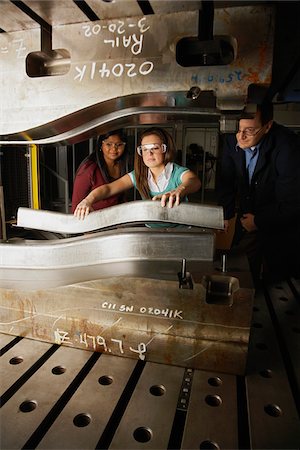 factory and closeup - Students with Teacher at Metal Press Stock Photo - Premium Royalty-Free, Code: 600-02201536