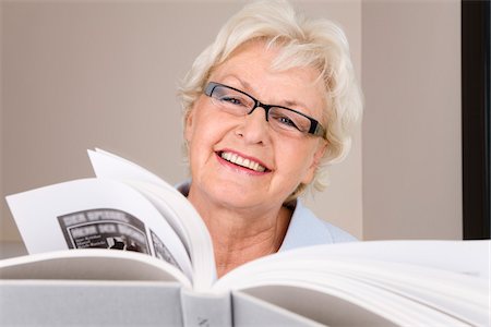 Portrait of Woman Reading Book Stock Photo - Premium Royalty-Free, Code: 600-02244865