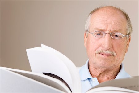 Portrait of Man Reading Book Stock Photo - Premium Royalty-Free, Code: 600-02244879