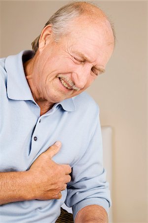 Man with Chest Pain Stock Photo - Premium Royalty-Free, Code: 600-02245221