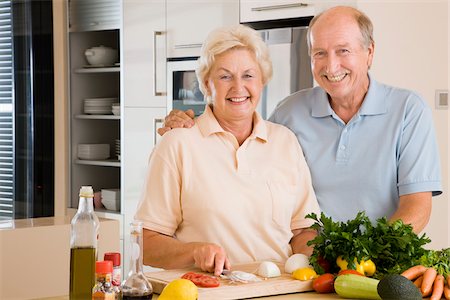 senior lifestyle cooking - Couple Slicing Vegetables Stock Photo - Premium Royalty-Free, Code: 600-02245247
