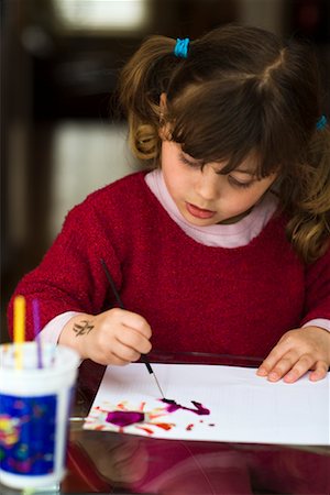 Little Girl Painting Stock Photo - Premium Royalty-Free, Code: 600-02245280