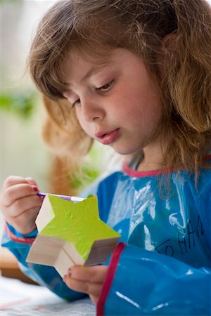 Little Girl Painting Stock Photo - Premium Royalty-Free, Code: 600-02245282