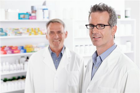 pharmacist looking at camera - Portrait of Pharmacists Stock Photo - Premium Royalty-Free, Code: 600-02245642