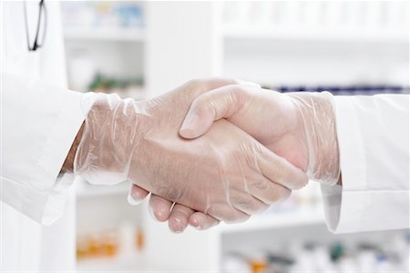 simsearch:700-00044954,k - Close-up of Pharmacists Shaking Hands Stock Photo - Premium Royalty-Free, Code: 600-02245651