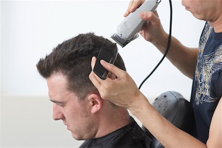 simsearch:600-01694630,k - Man at Barber Stock Photo - Premium Royalty-Free, Code: 600-02264704