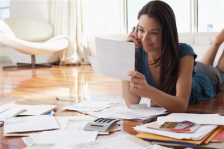 paying bills - Woman Talking on Telephone Stock Photo - Premium Royalty-Free, Code: 600-02264730