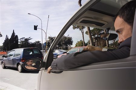 suit inside car - Man Stuck in Traffic Stock Photo - Premium Royalty-Free, Code: 600-02264783