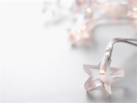 simsearch:600-02264797,k - Star-Shaped Christmas Lights Fotografie stock - Premium Royalty-Free, Codice: 600-02264812