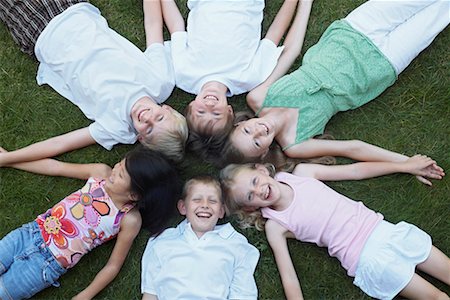 simsearch:700-03520592,k - Group of Kids Lying in a Circle, Elmvale, Ontario, Canada Stock Photo - Premium Royalty-Free, Code: 600-02265294