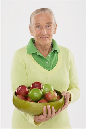 single old woman - Woman Holding Bowl of Apples Foto de stock - Sin royalties Premium, Código: 600-02265511